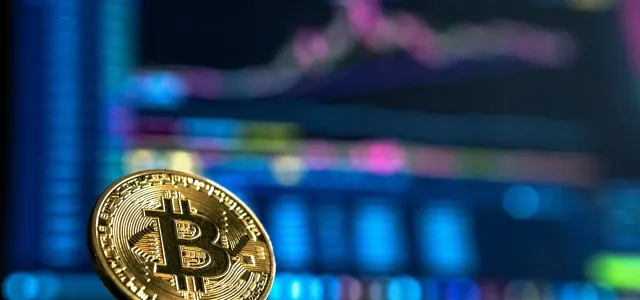gold-colored Bitcoin by André François McKenzie courtesy of Unsplash.