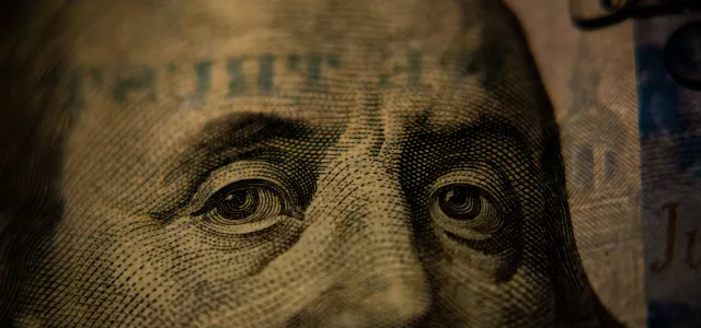 a close up of a one dollar bill by Adam Nir courtesy of Unsplash.